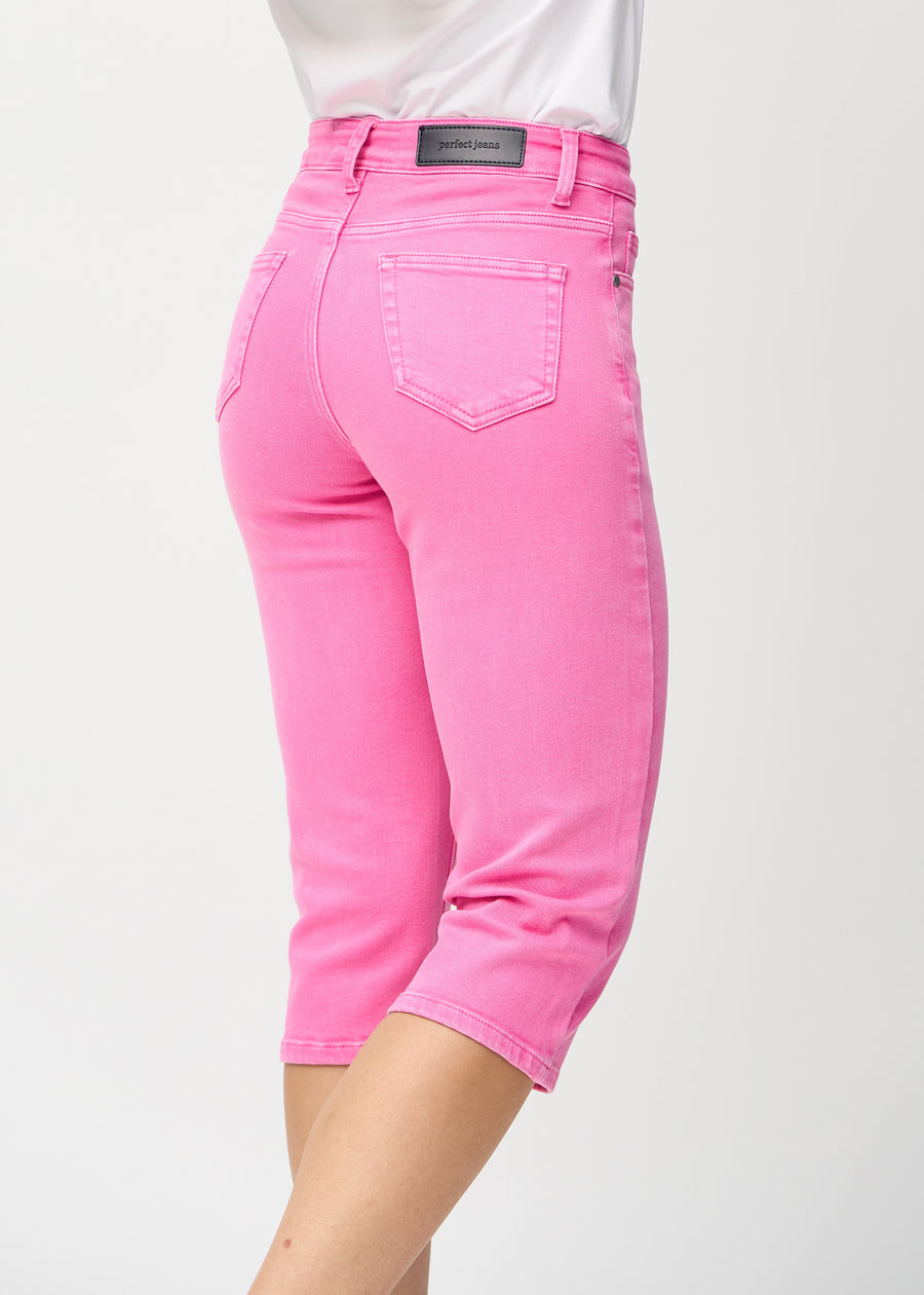Light pink regular capris seen from the back close up to show details.