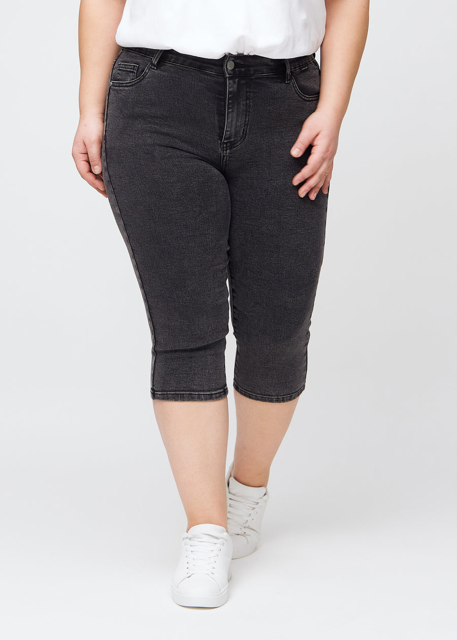 Dark grey Skinny capris in Shadows, shown from the front on a model.