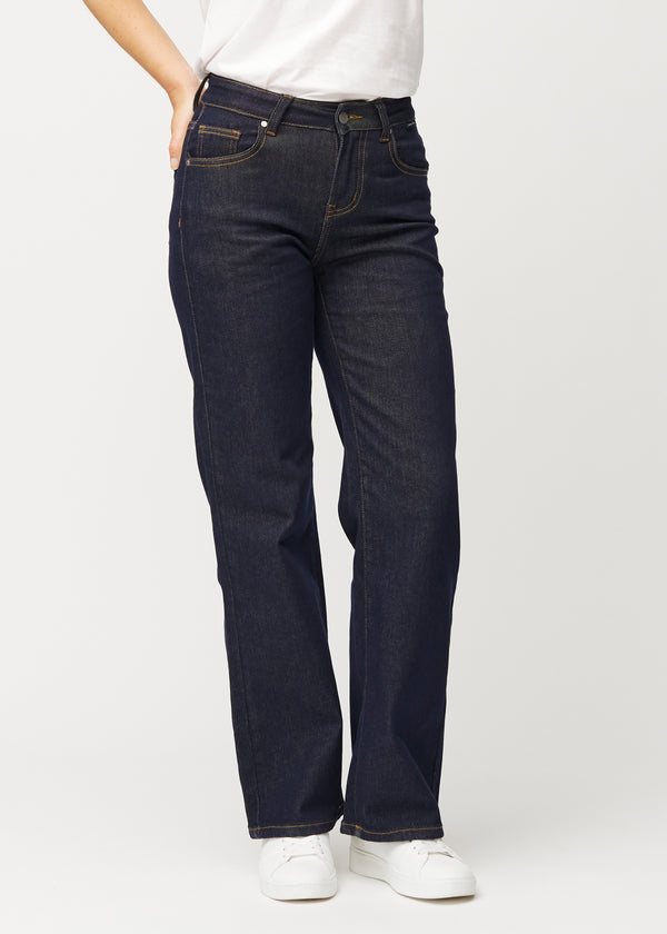 Deep dark blue denim jeans for women in the colour Midnights with a loose fit that sits close at the waist and falls loosely down the legs, seen from the front.