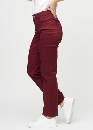Regular jeans for women in dark red, color Santas. Side view on a model.