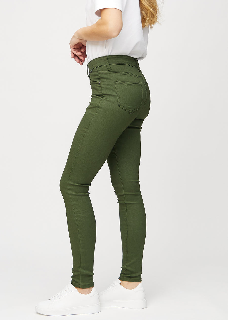 Skinny jeans for women in dark green, color Renewals. Side view on a model.