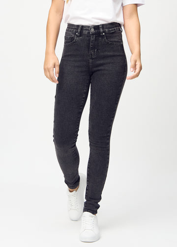 Dark grey denim skinny jeans, model name Shadows, which fits closely to the leg, seen from the front.