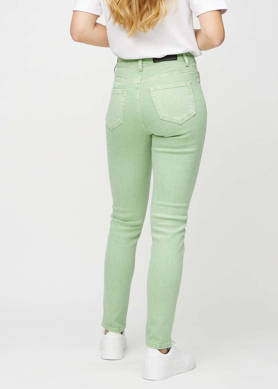Slim jeans for women in light green, color Mints. Back view on a model, showing the overall fit.