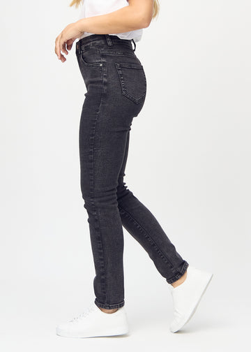 Slim jeans for women in dark grey, color Shadows. Side view on a model.