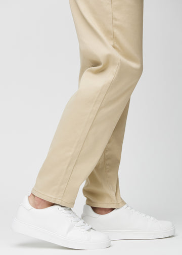 The ankles of a model, so you can see how loose the jeans fit.