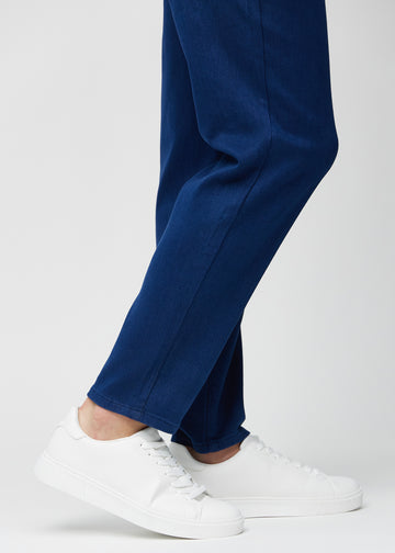 The ankles of a model, so you can see how loose the jeans fit.