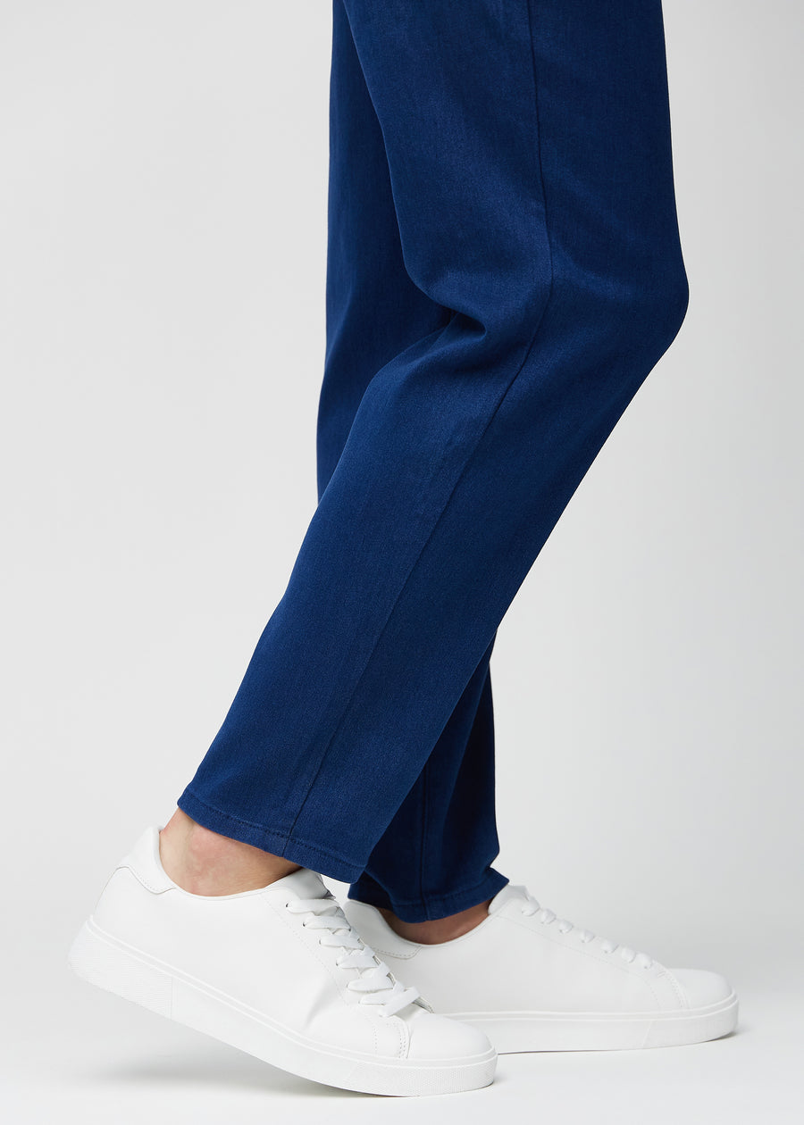 The ankles of a model, so you can see how loose the jeans fit.